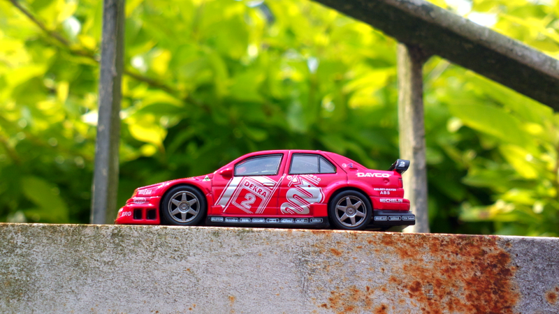 Illustration for article titled Celebratory Kyosho DTM Alfa Romeo 155 V6